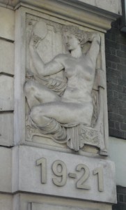 Caryatid with mirror at Hatton Garden