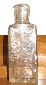 Rowland Macassar Oil bottle.